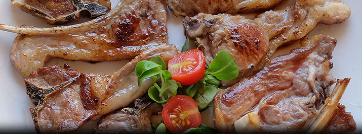 Milk fed baby lamb, foodies in Malaga, Spain