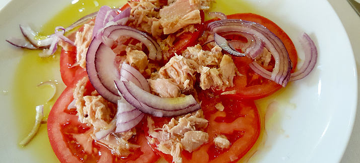 Madrid foodies, Keeping It Simple
Ripe tasty tomato with onion and tuna in olive oil, a light first course at lunch